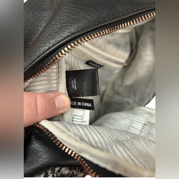 Torrid Elegant Black Faux Leather Backpack With Boucle Sweater Front Pocket main image 4